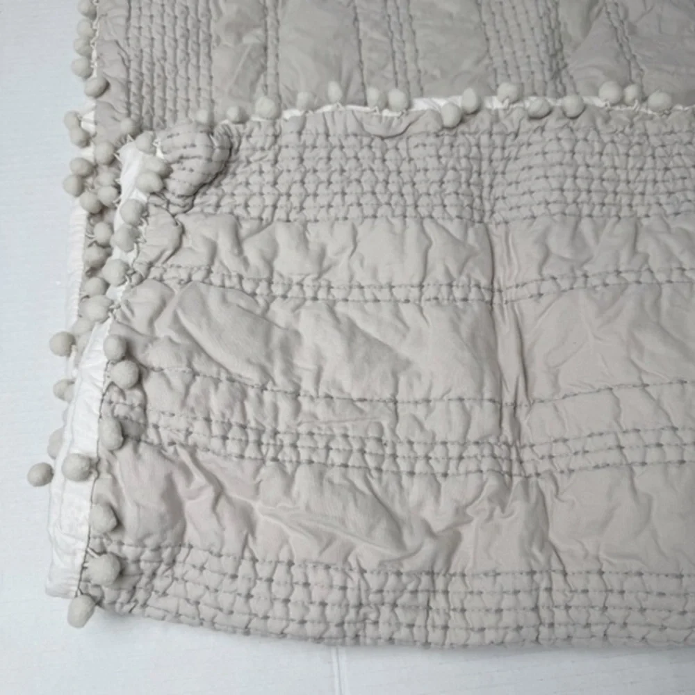 2 Bee & Willow gray quilted tassel standard pillow shams